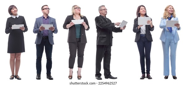 a group of people are holding a tablet and looking to the side - Shutterstock ID 2254962527