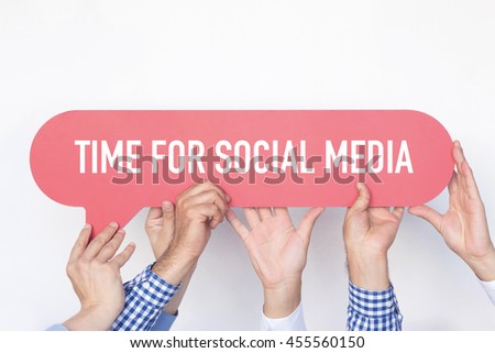 Group of people holding the TIME FOR SOCIAL MEDIA written speech bubble