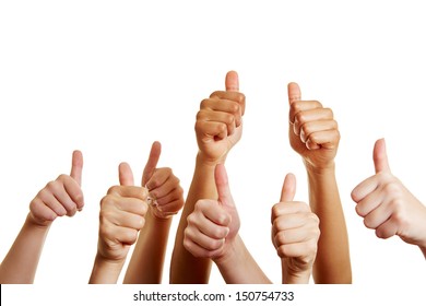 Group of people holds many thumbs up and congratulates the winner - Shutterstock ID 150754733