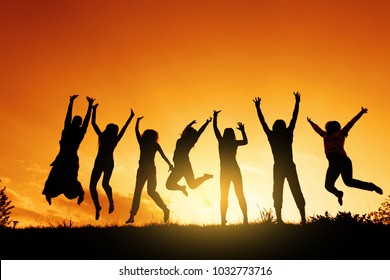 Group People Jumping Against Sunset Stock Photo 1032773716 | Shutterstock