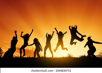 Group People Jumping Against Sunset Stock Photo 1044834751 | Shutterstock