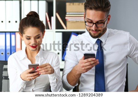 Group of people look at phones in arms at office portrait. Read news mania send sms chat addict use electronic bank modern lifestyle idea job plan colleague share blog tweet web search concept