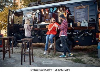 Group Of People At Opening Mobile Fast Food Restaurant On Wheels