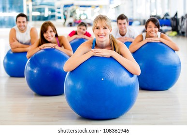 Group Of People In A Pilates Class At The Gym