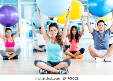 Group Of People In A Pilates Class At The Gym