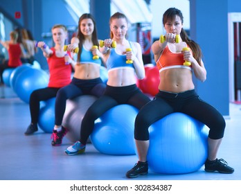 Group Of People In A Pilates Class At The Gym