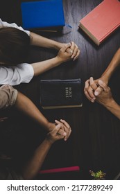  Group of people praying worship believe. soft focus, praying and praise together at home. devotional or prayer meeting concept. - Shutterstock ID 2177289249