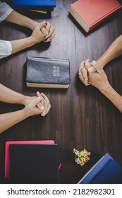  Group of people praying worship believe. soft focus, praying and praise together at home. devotional or prayer meeting concept. - Shutterstock ID 2182982301