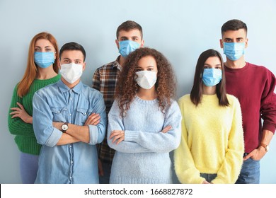 Group Of People With Protective Masks On Light Background. Concept Of Epidemic