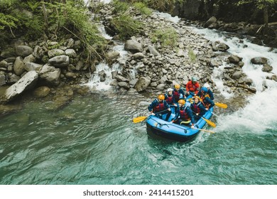 Group of people rafting in rubber dinghy on a river - Powered by Shutterstock