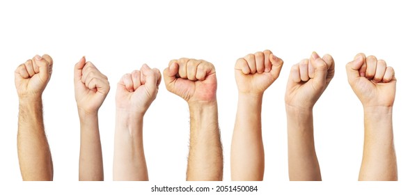 Group of people raised fists up as a victory, proud, success or strength symbol 