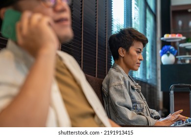 Group Of People Relaxing At Airport Private Lounge And Waiting For Boarding At International Airport Terminal. Airline Passenger Service Business, Airplane Transportation And Holiday Vacation Concept.