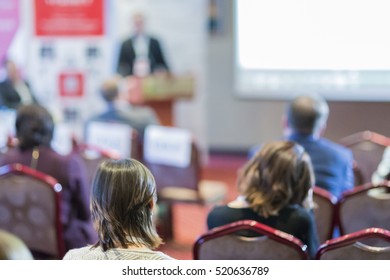 Group of People Sitting In Front of the Big Screen During Conference.Horizontal Image Orientation - Shutterstock ID 520636789
