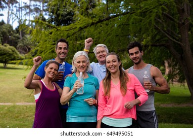 Group Of People Standing Together In Park