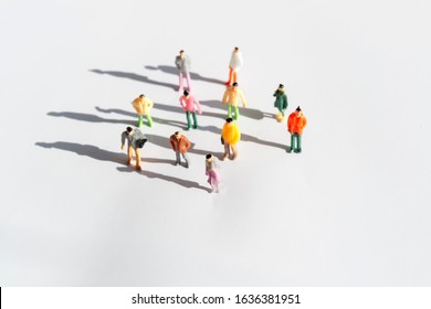 A group of people standing and walking - Shutterstock ID 1636381951