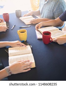 A Group of People Studying the Bible Outside