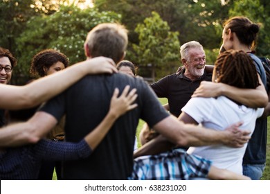 Group of people support unity arm around together - Shutterstock ID 638231020