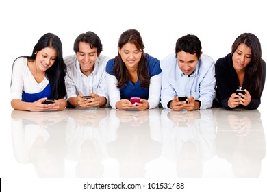 Group Of People Texting On Their Cell Phones - Isolated Over A White Background