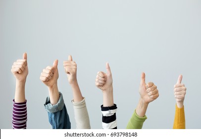 Group Of People Thumbs Up