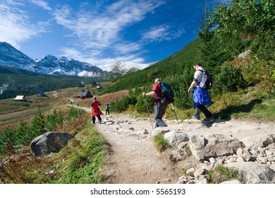 Group Of People Trekking In Tatra Mountains, Poland