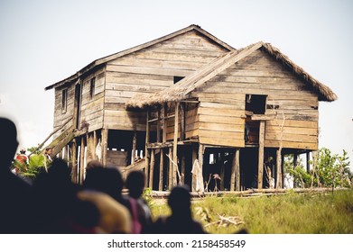 A Group Of People In A Village In Honduras