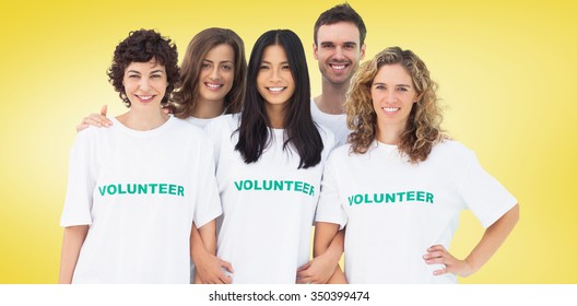 Group Of People Wearing Volunteer Tshirt Against Yellow Vignette