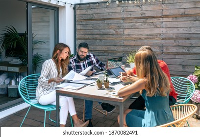 Group Of People In A Work Meeting On The Terrace Of The Office