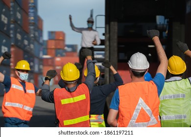 Group of people worker protesting in factory . Male  group of protestors fists raised up in the air - Shutterstock ID 1861197211