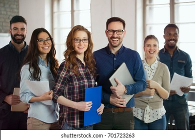 Group Picture Of Young Successful Team Of Designers