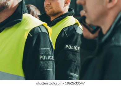 Group Of Police Officers Heading For Intervention On The City Streets