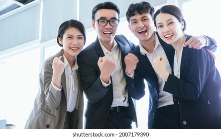 Group Portrait Of Asian Business People
