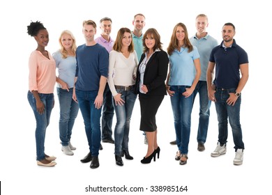 Group Portrait Of Creative Business People Standing Together Over White Background