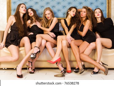 Group Portrait Of Models In Black Dresses