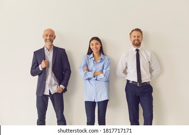 Group Portrait Of Positive Multiethnic Multi-generational Company Workers. Team Of Happy Smiling Office Employees Of Different Ages And Nationalities Looking At Camera. Diversity And Equality At Work