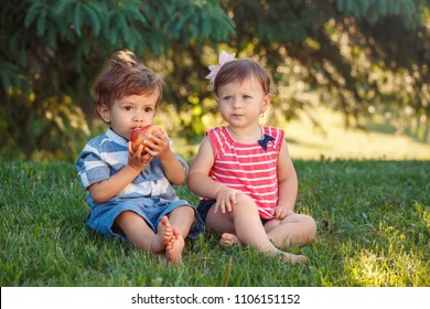 Boy Girl Sitting Together On Grass Stock Photo 111167933 | Shutterstock