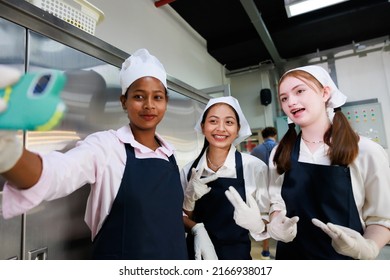 Group Portrait Young Teen Girl Cook Student. Cooking Class. Culinary Classroom. Happy Young Taking Selfie Photo By Smartphone In Cooking School. 