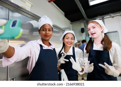 Group Portrait Young Teen Girl Cook Student. Cooking Class. Culinary Classroom. Happy Young Taking Selfie Photo By Smartphone In Cooking School. 