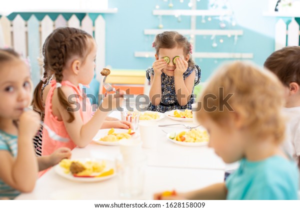 Group Preschool Children Eating Plates Day Stock Photo (Edit Now ...