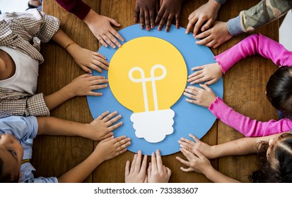 A group of primary schoolers learning about electricity conservation - Shutterstock ID 733383607