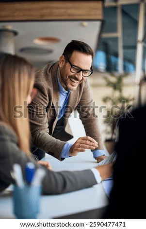 Group of professionals collaborating in an office setting for business planning.