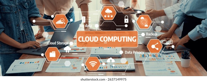 A group of professionals engaging in a cloud computing workshop, exploring data management strategies with charts and technology in a modern workspace setting. Amity