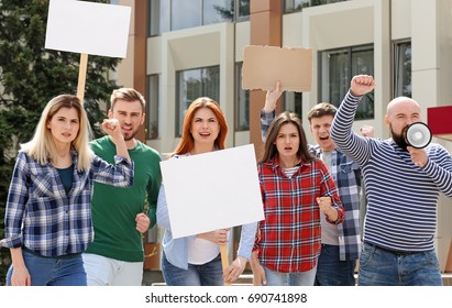 Group of protesting young people on street