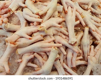 Group Of Raw Chicken Feet In The Food Market.