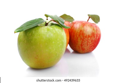 group of red and green fresh ripe apples isolated over white background