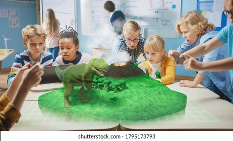 Group of School Children Use Digital Tablet Computers with Augmented Reality App, Looking at Educational 3D Animation - Dinosaur Walking on Island with Active Volcano. VFX, Special Effects Render