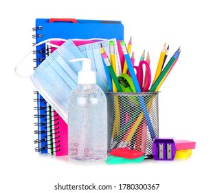 Group Of School Supplies And COVID 19 Prevention Items Isolated On A White Background. Back To School During Pandemic Con