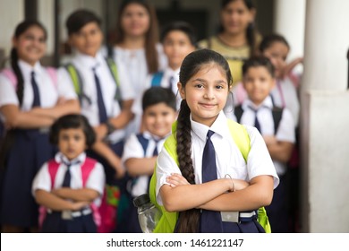 Group of schoolboys and schoolgirls at school campus - Powered by Shutterstock