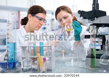 Group of scientists working at the laboratory