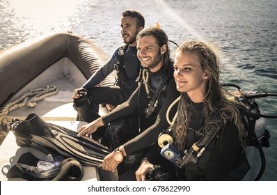 Group Of Scuba Divers Going To The Dive Point With A Boat