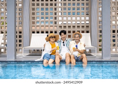 Group of senior Asian family with son hanging out together by swimming pool in tropical resort hotel for summer vacation travel and happy retirement elder for healthy aging activity wellness - Powered by Shutterstock